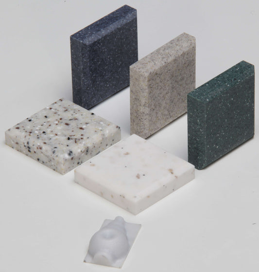 5 Blöcke aus Corian in verschiedenen Steinmustern